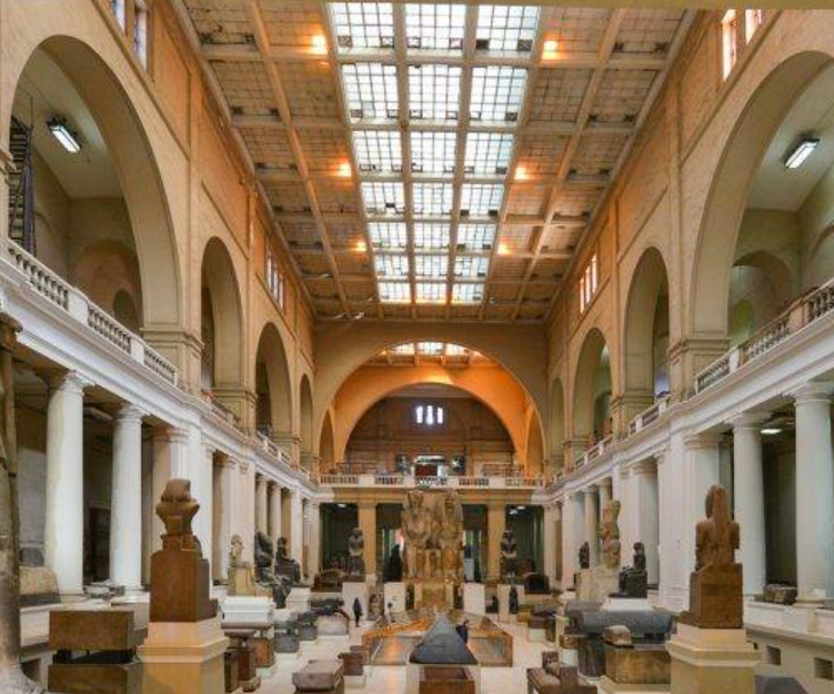 Grand hall of the National Museum of Egyptian Civilization with ancient statues